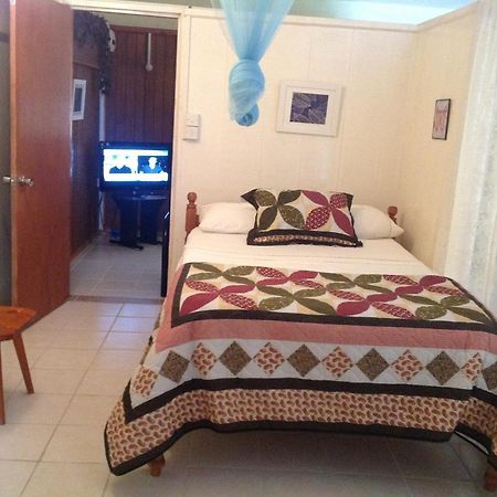 Rainbow Beach Apartments & Rooms Calibishie ภายนอก รูปภาพ