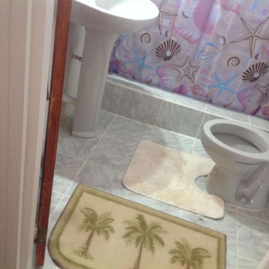 Rainbow Beach Apartments & Rooms Calibishie ภายนอก รูปภาพ