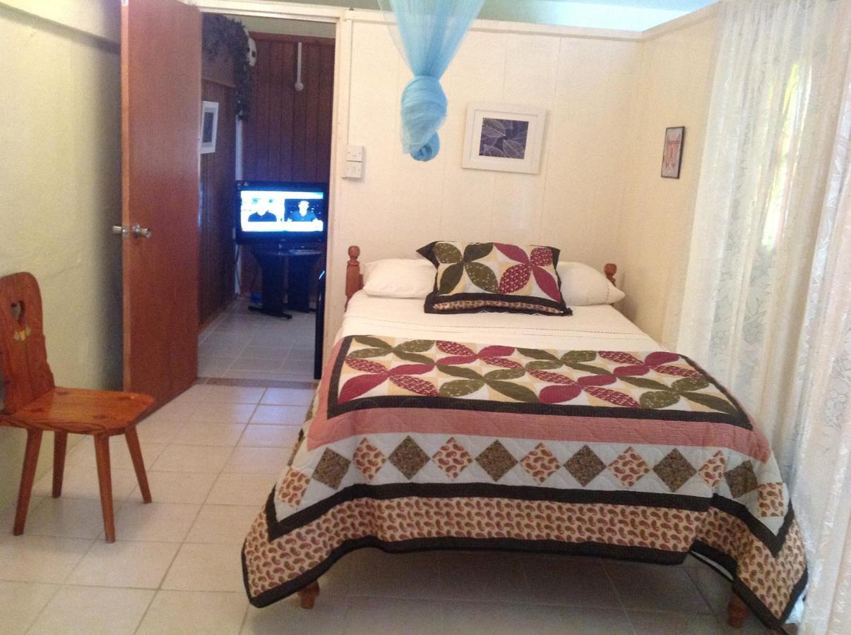 Rainbow Beach Apartments & Rooms Calibishie ภายนอก รูปภาพ
