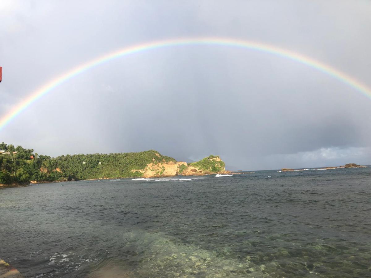 Rainbow Beach Apartments & Rooms Calibishie ภายนอก รูปภาพ