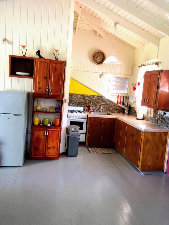 Rainbow Beach Apartments & Rooms Calibishie ภายนอก รูปภาพ