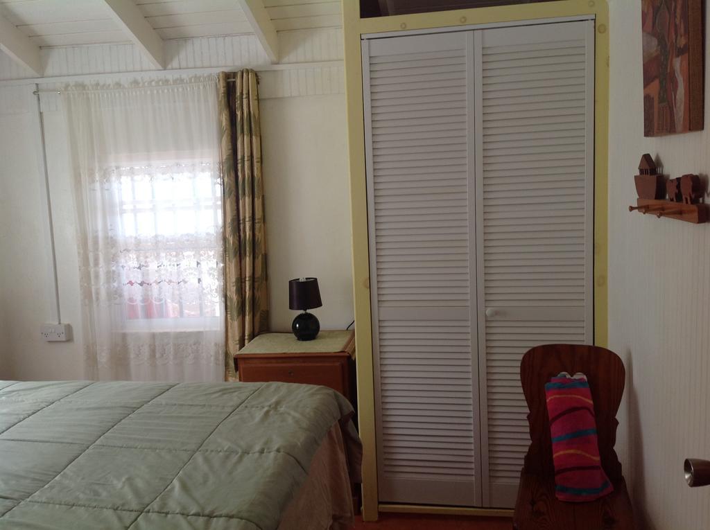 Rainbow Beach Apartments & Rooms Calibishie ภายนอก รูปภาพ