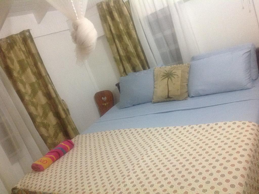 Rainbow Beach Apartments & Rooms Calibishie ห้อง รูปภาพ
