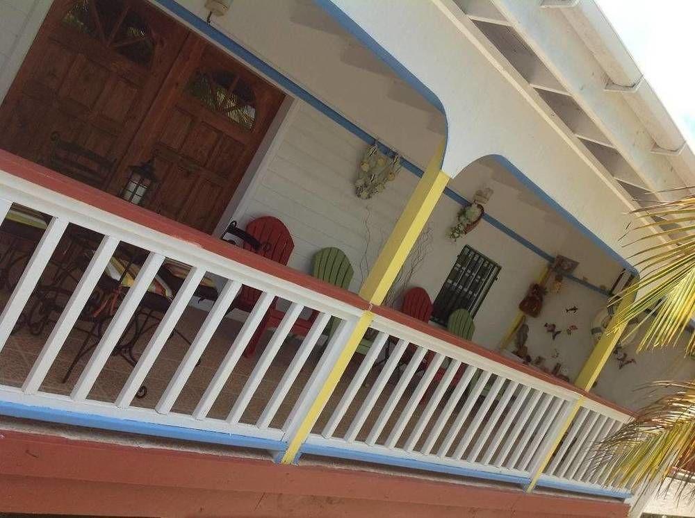 Rainbow Beach Apartments & Rooms Calibishie ภายนอก รูปภาพ