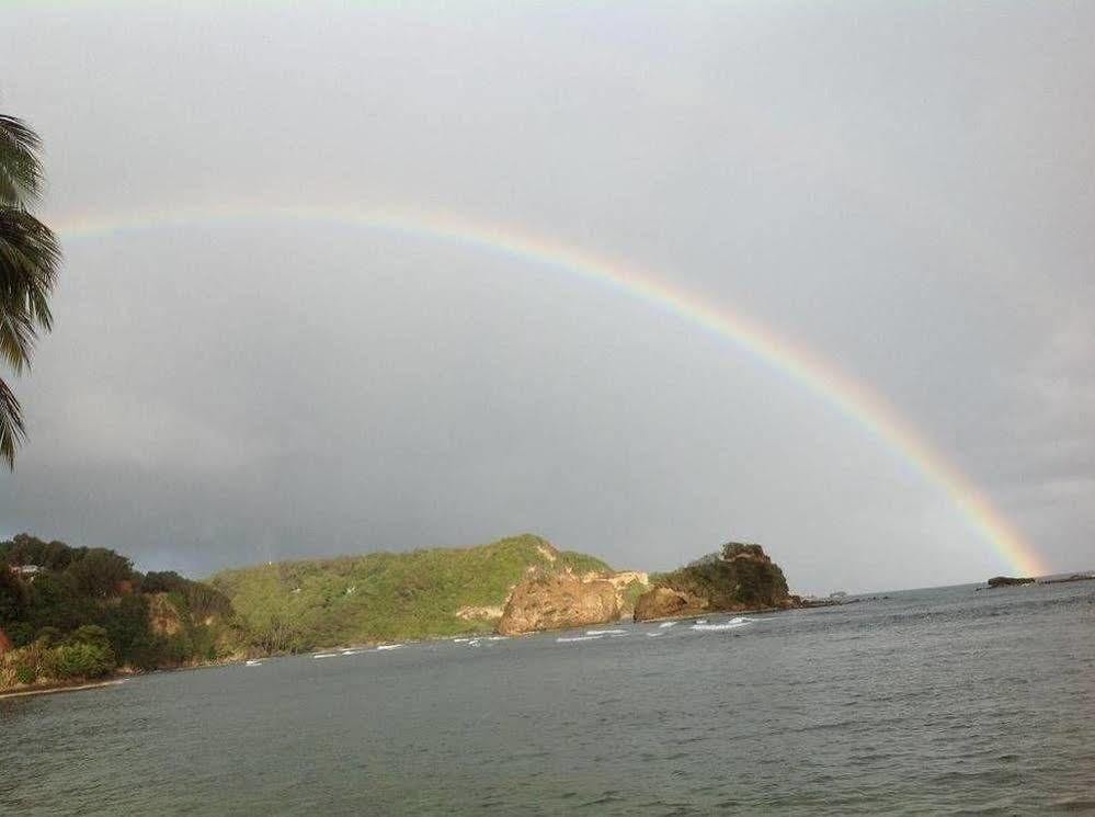 Rainbow Beach Apartments & Rooms Calibishie ภายนอก รูปภาพ