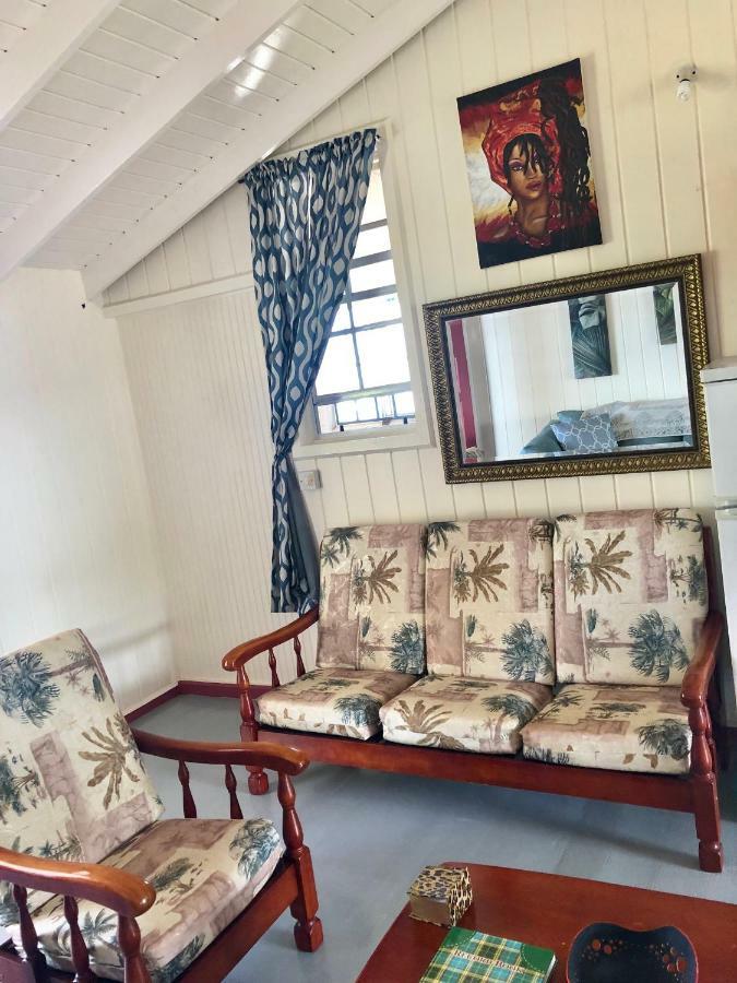 Rainbow Beach Apartments & Rooms Calibishie ภายนอก รูปภาพ